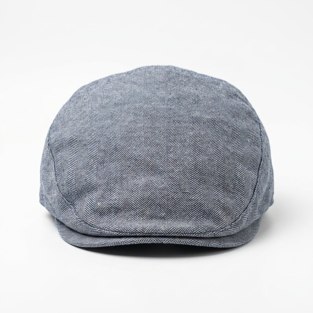 Vorderansicht der Flatcap in Anthrazit meliert mit Fischgrätenoptik