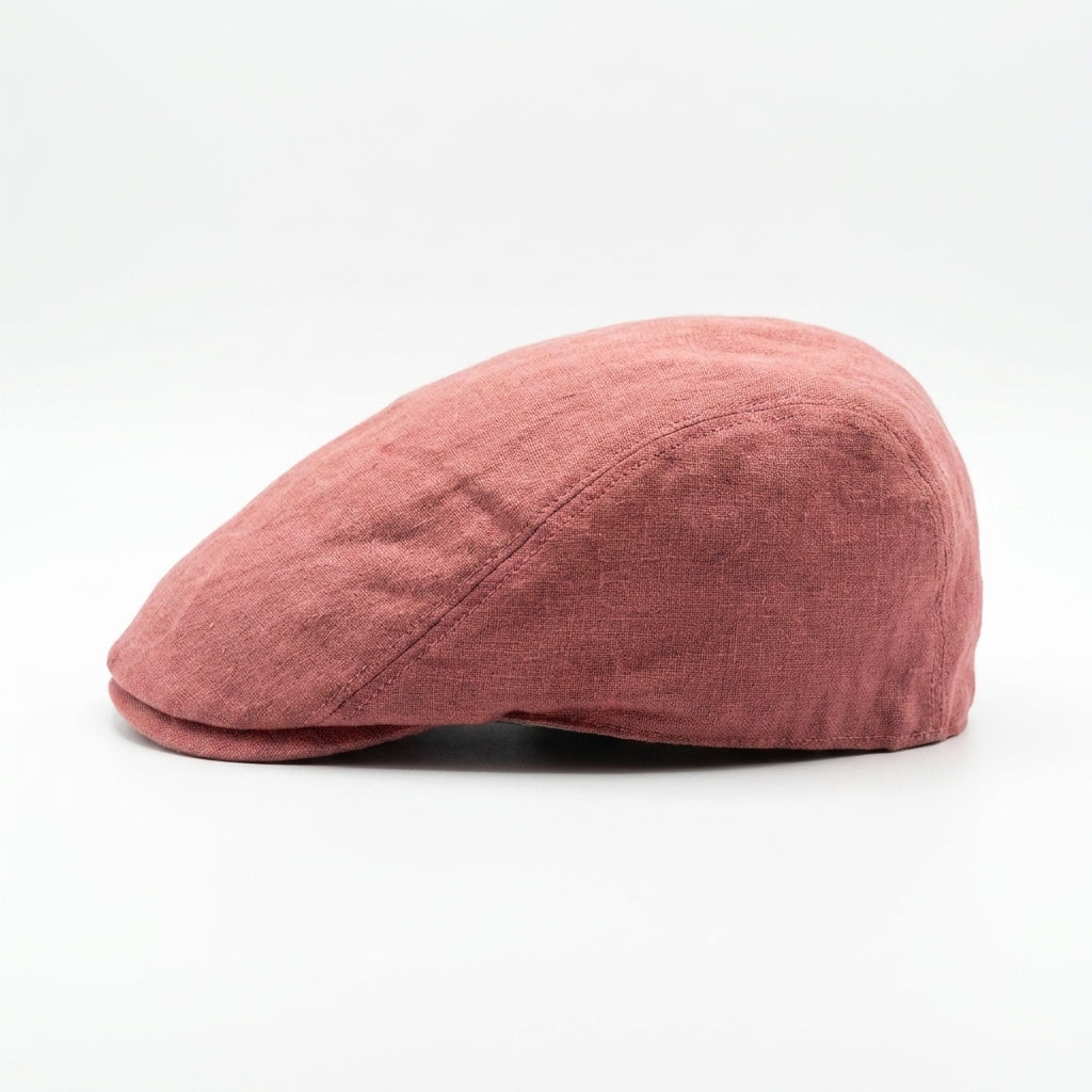 Linke Seitenansicht der roten Flatcap aus Leinen