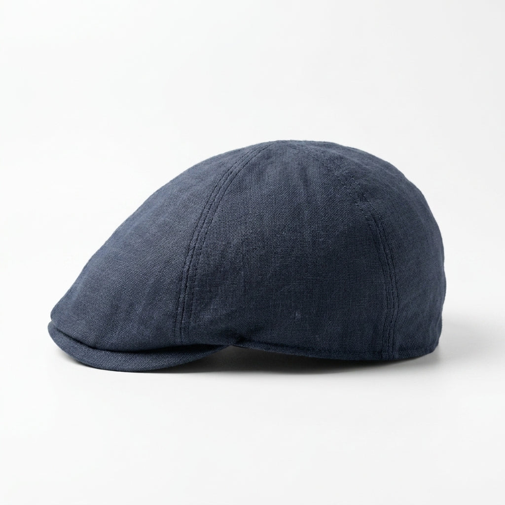 Flatcap aus Leinen in Navy, linke Seitenansicht